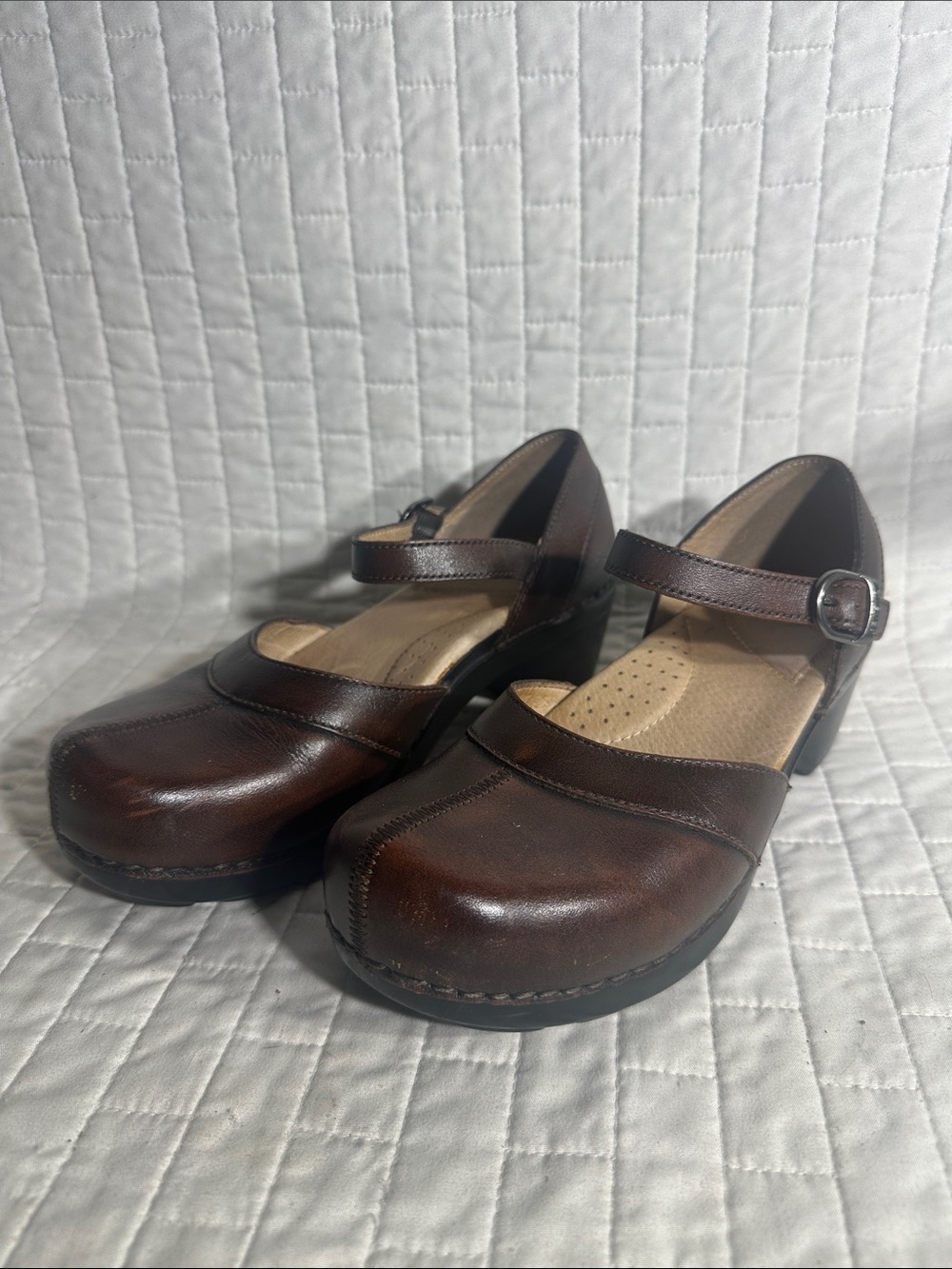Dansko Sam brown leather Mary Jane clogs with a buckle strap